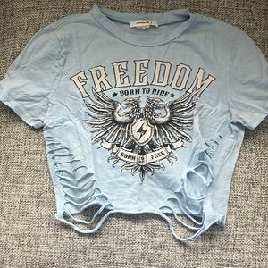 Blue freedom with cuts in bottom cropped tee shirt